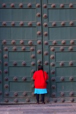 Praying at the Church Door in Peru