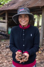 Woman with Cashew Nuts in Cambodia